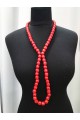 Long red necklace (strung on an elastic band)