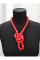 Long red necklace (strung on an elastic band)