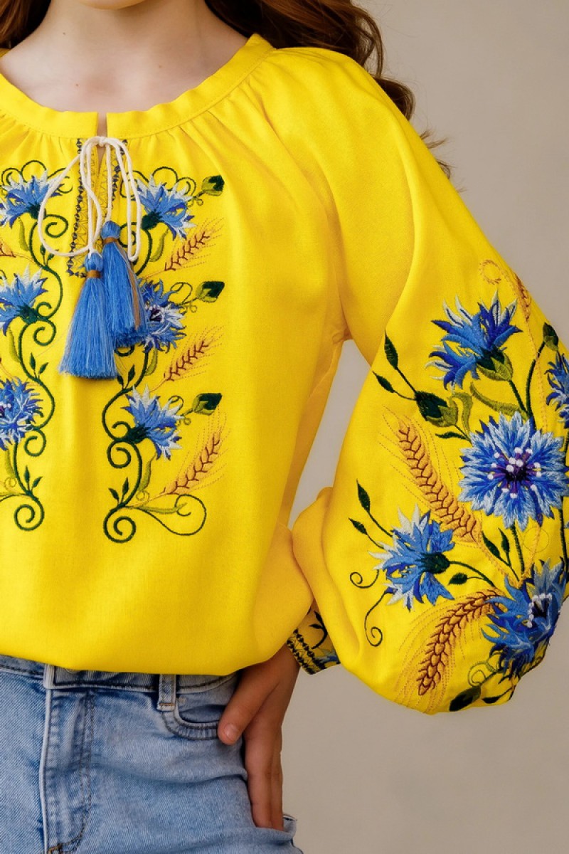 Yellow embroidered shirt for a girl with a blue ornament Vasylinka