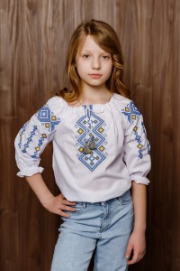 Біла дівчача вишиванка з жовто-синьою вишивкою Забава