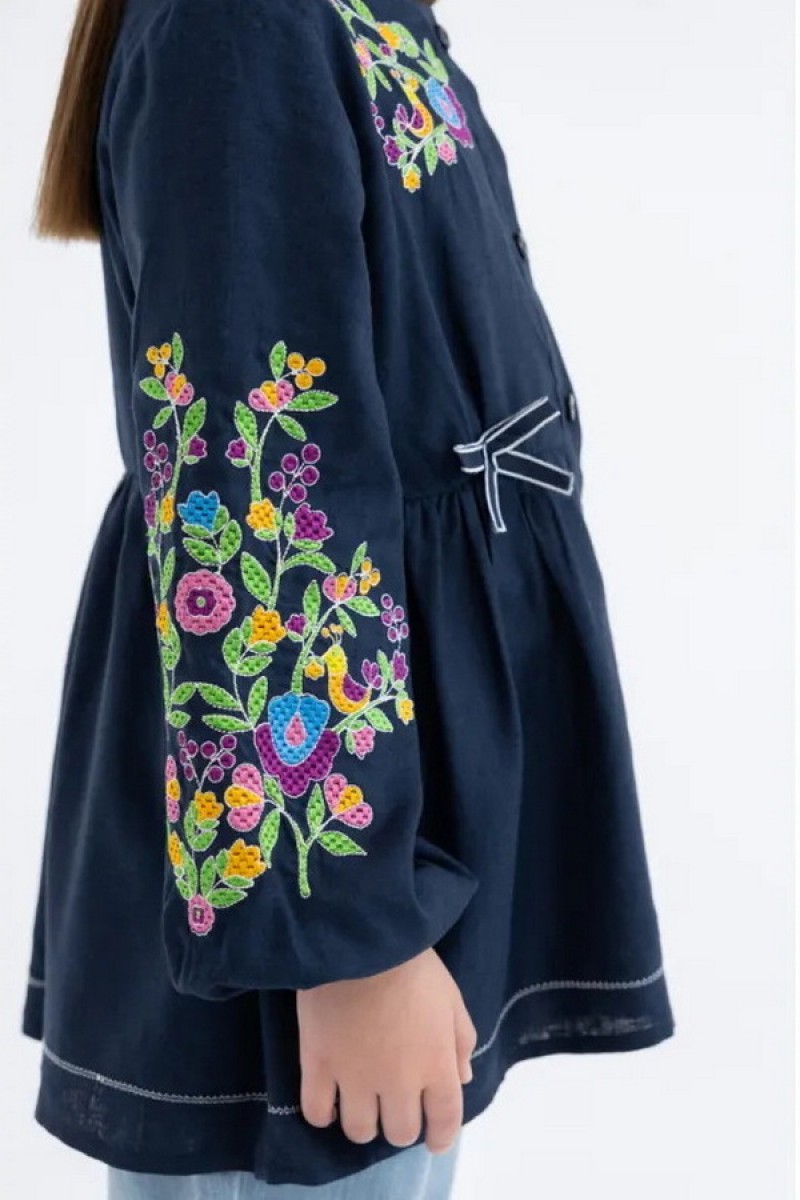 Embroidered tunic for a girl made of white linen Stasia
