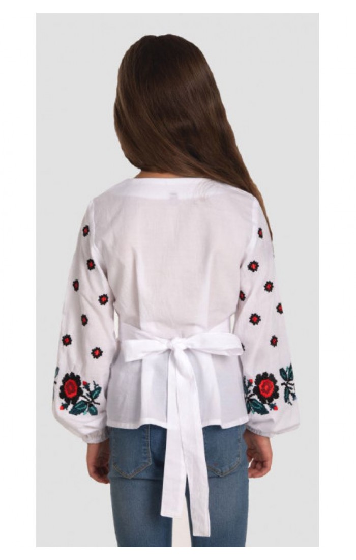 A charming embroidered shirt for a girl