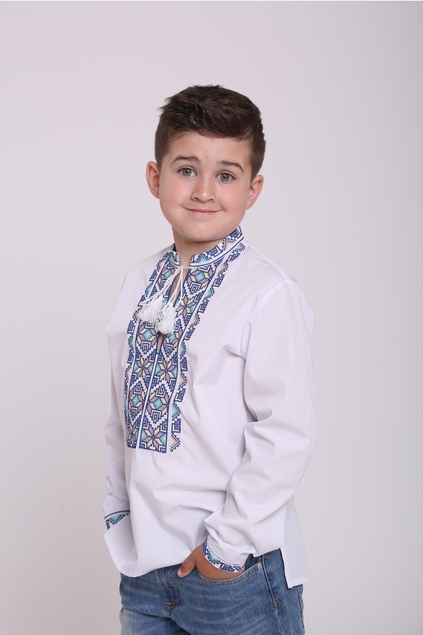White embroidered shirt for a boy with blue embroidery 44024