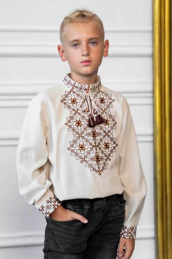 Beige shirt for a boy with chocolate-colored Unity embroidery