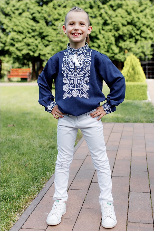 Blue embroidered shirt with white embroidery for the boy Vsevolod