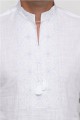 is white, and men's white embroidered shirt on white