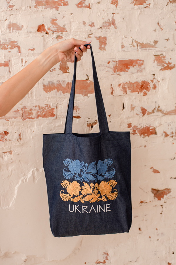 Patriotic shopper tote bag with yellow-and-blue embroidery