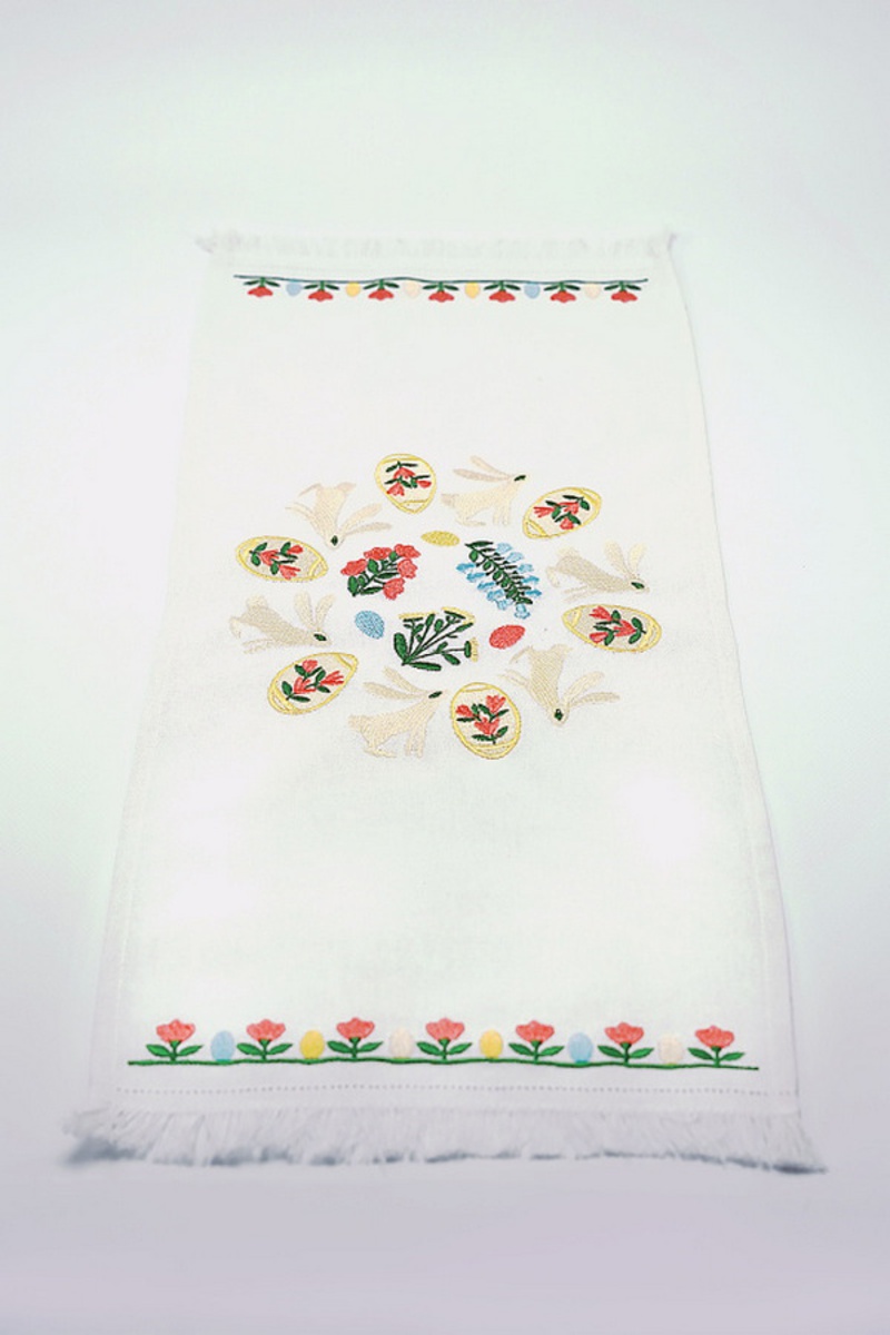Easter towel with an image of pysanky and yellow bunnies, 33x65 cm