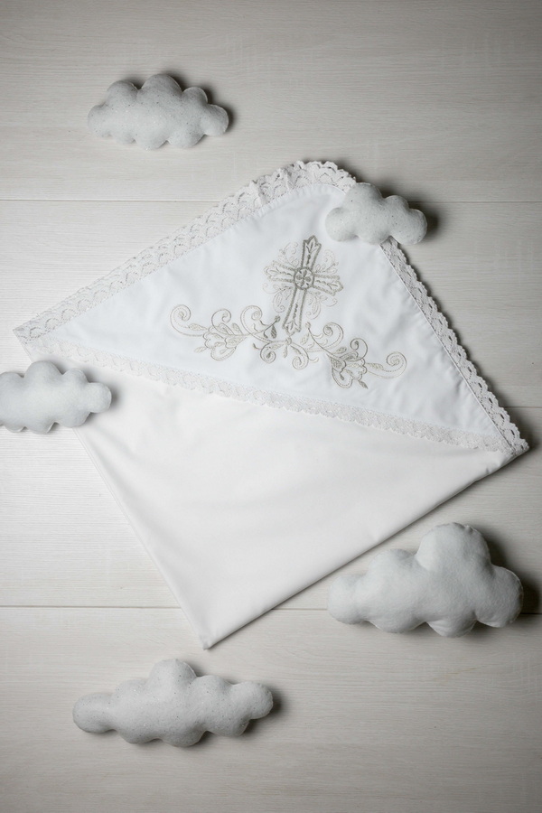 White baptismal shawl with silver embroidery of a Cross