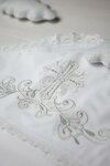 White baptismal shawl with silver embroidery of a Cross