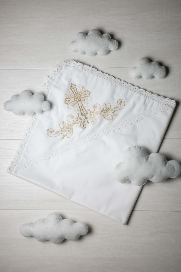 White baptismal shawl with embroidery of a Cross
