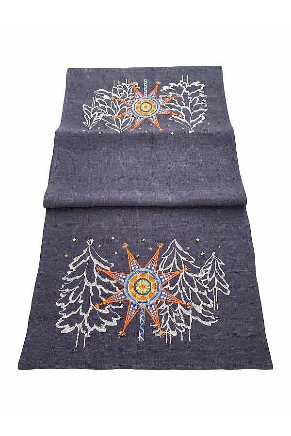 Linen tablecloth with embroidered festive Christmas star