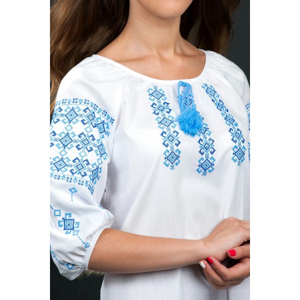 Women's embroidered shirt Horns are blue on white cotton