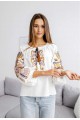 Women's milk embroidered shirt with gold embroidered neckline.