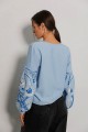 Вишиванка жіноча Вогнеслава, блакитна  з оригінальною білою вишивкою на рукавах, L