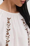 Women's embroidered blouse in milk color with brown satin-stitched flowers