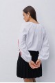 White embroidered shirt "Veresneva", red embroidery with flowers on the sleeves.