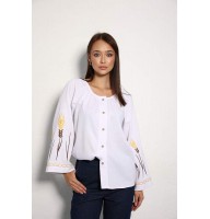 Women's white embroidered shirt with wheat ears.