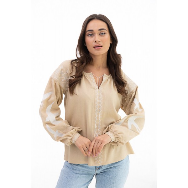 Women's light beige embroidered shirt with swallows