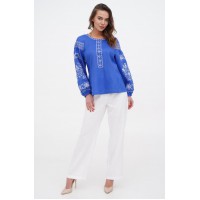 Blue embroidered women's blouse  Stork.