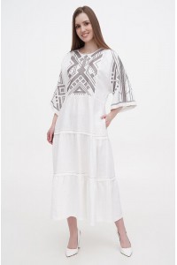 Boyana's long white embroidered linen dress is new