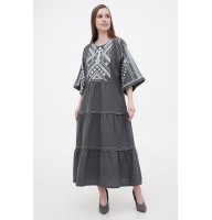 Boyana's long gray embroidered linen dress is new