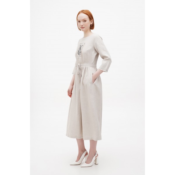 Синее платье, вышитое оржицей. Синее платье, вышитое оржицей.