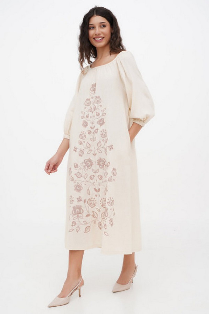 Dress made of milk linen with Krajana embroidery - style and comfort!