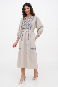 Dress made of beige linen with embroidery by Kvita