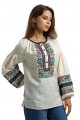 Women's embroidered shirt Dobrodia made of 100% linen in cream color with pink-purple embroidery.