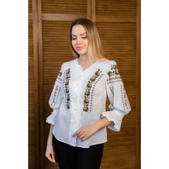 Women's milk embroidered shirt with gold embroidered neckline.