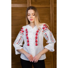 Women's milk embroidered shirt with gold embroidered neckline.