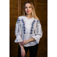 Women's milk embroidered shirt with gold embroidered neckline.