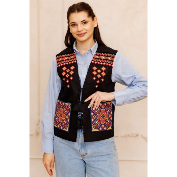 Black vest with geometric embroidery, size L