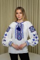 Біла вишиванка з синім орнаментом Руслана
