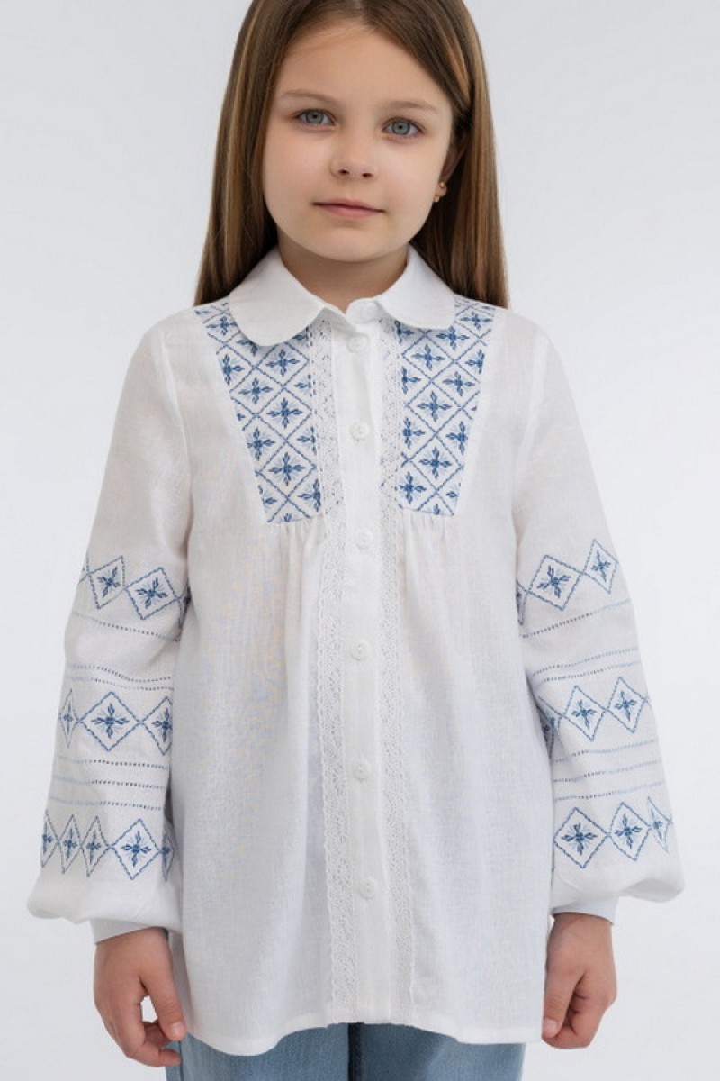 Embroidered tunic for a girl made of milk linen Slava