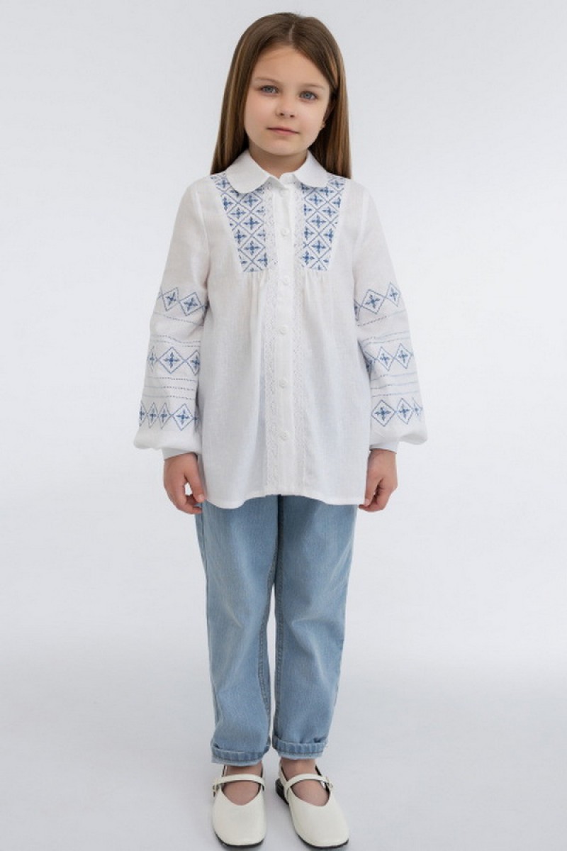 Embroidered tunic for a girl made of milk linen Slava