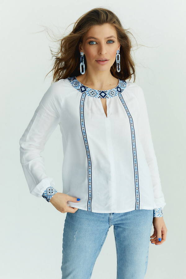 White women's blouse with "Protective Necklace" embroidery blue