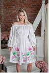 Miracle flower the dress is embroidered in black
