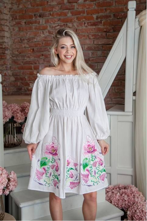Miracle flower the dress is embroidered in black