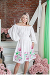 Miracle flower the dress is embroidered in black