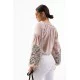 Women's light beige embroidered shirt with flowers on the sleeves